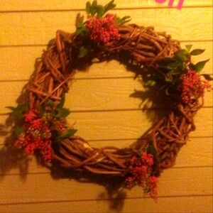 ?wreaths and Thanksgiving baskets yellow berries orange blossoms brown baskets